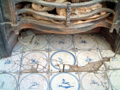 Damaged fireplace tiles